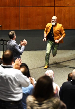 Mark A. Grainger engaging an audience during an immersive event